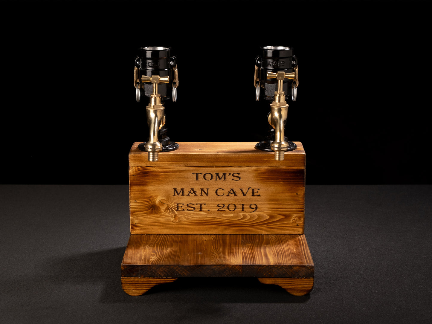 wooden beer taps: "Wooden beer taps for a rustic bar experience."