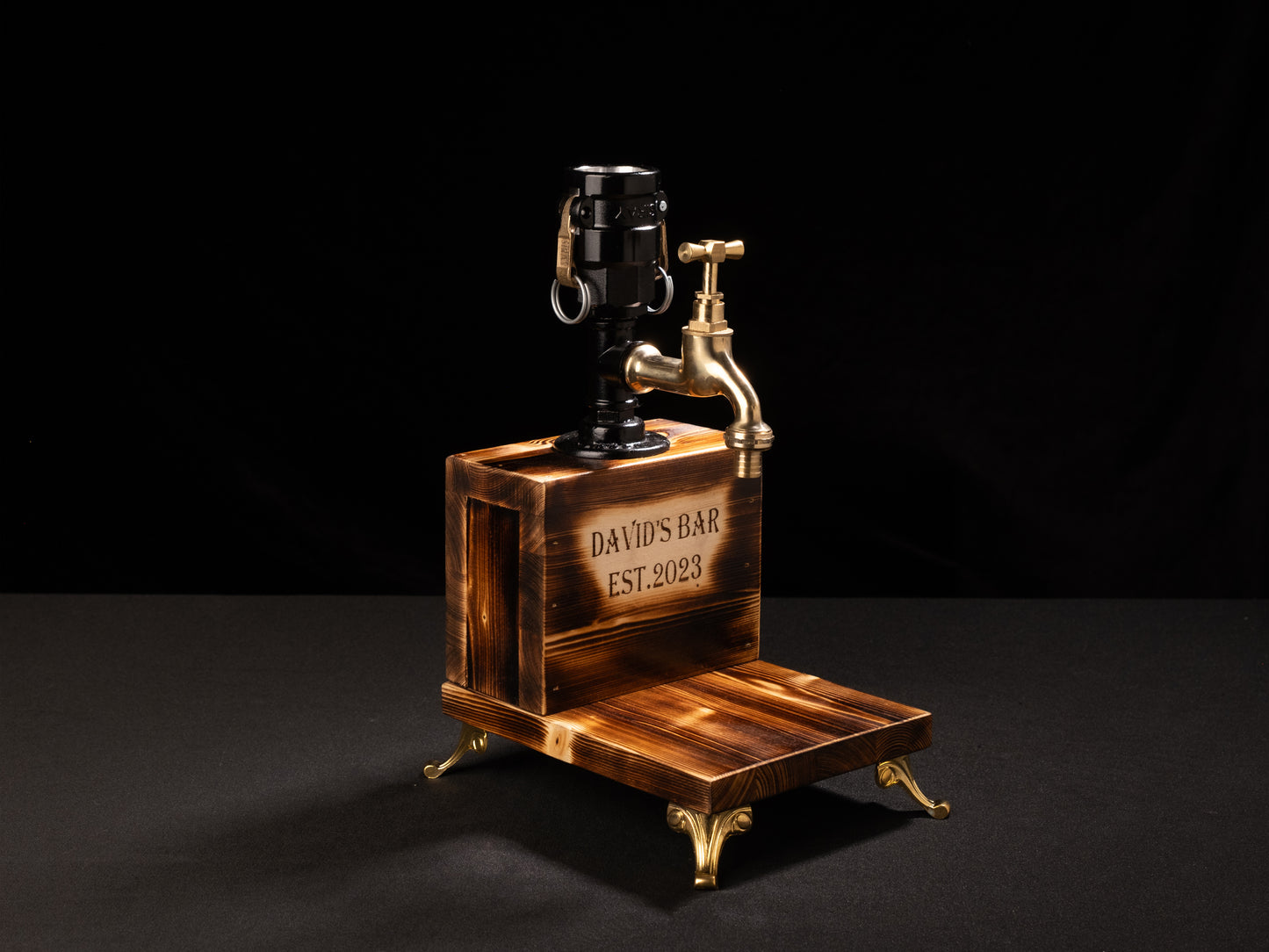 wooden beer taps: "Wooden beer taps for a rustic bar experience."