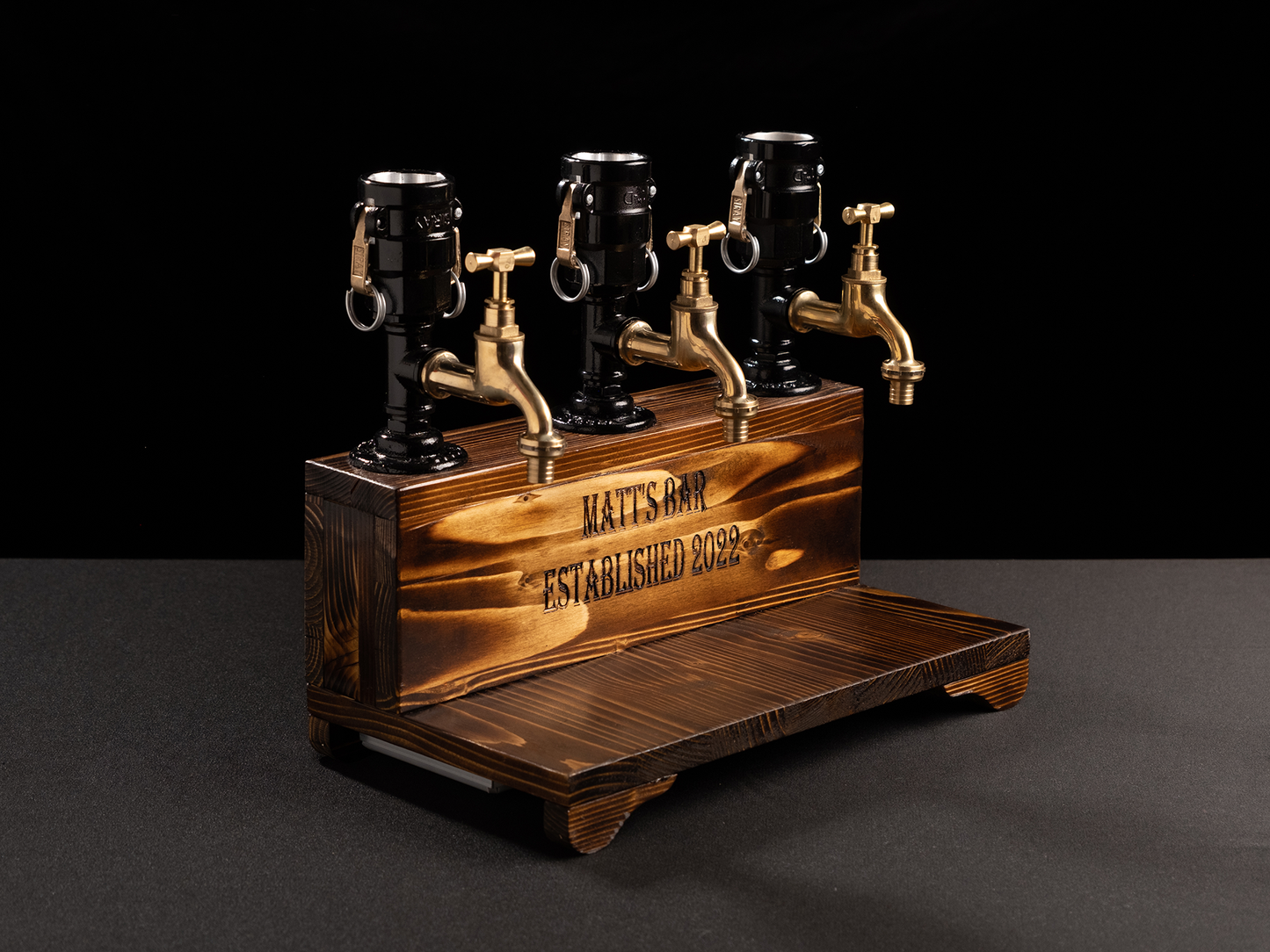 wooden beer taps: "Wooden beer taps for a rustic bar experience."